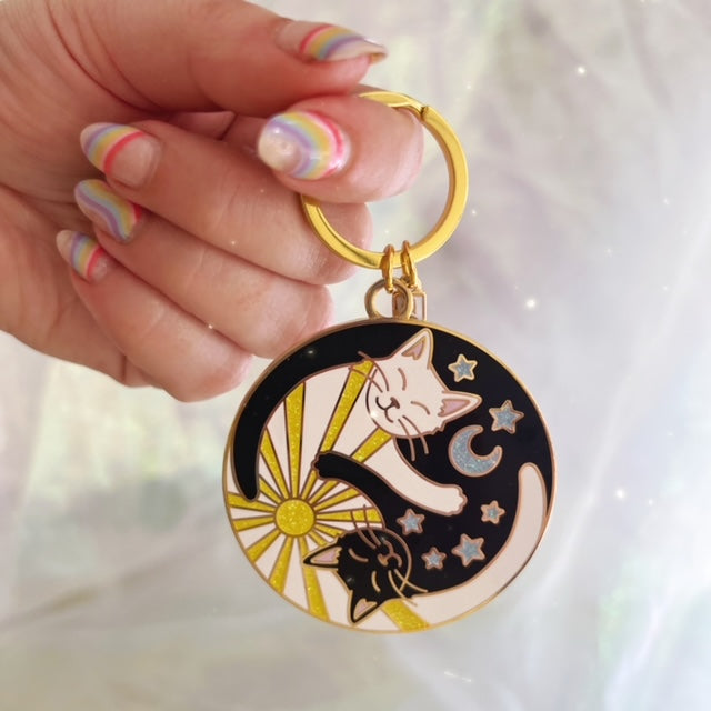 AC00333-MLT-OS - Yin Yang Cats Enamel Keychain - Wildflower + Co - scale in hand