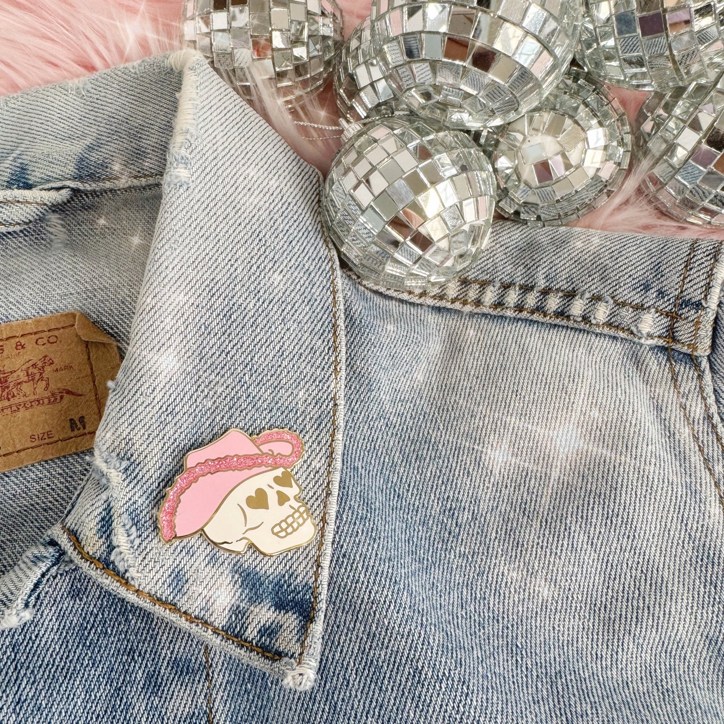 AC00458-MLT-OS - Cowgirl Skull Enamel Pin - Wildflower + Co on jacket