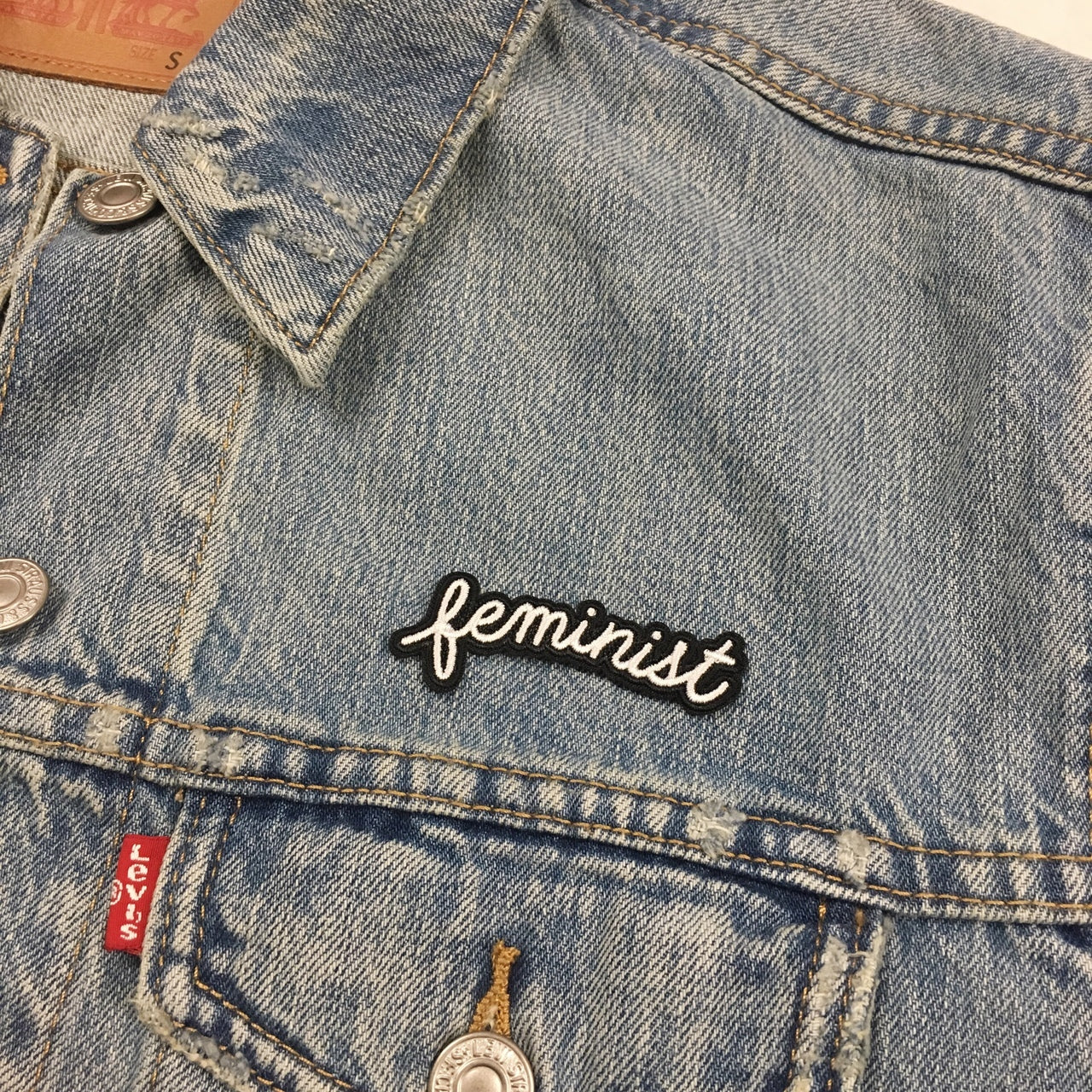 TR00213-BLK-OS-R_Feminist_Patch_-_Iron_On_Patches_Appliques_-_Wilflower_Co._-_Denim jacket