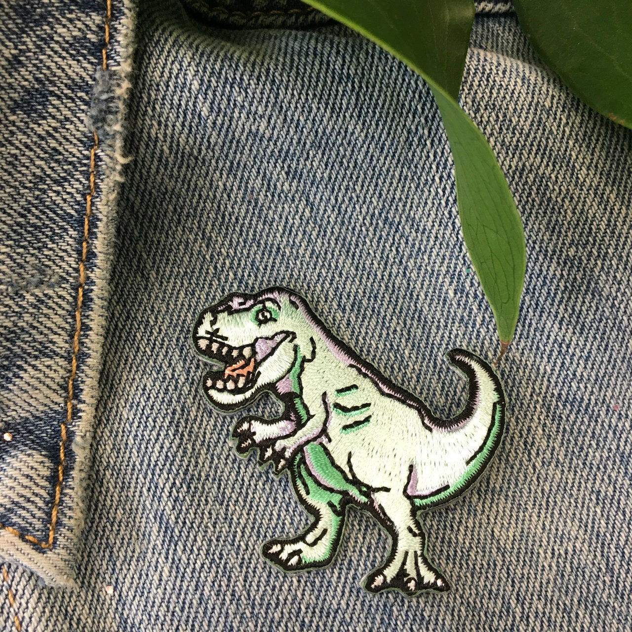 TR00252-MLT-OS - T-Rex_Dinosaur_Embroidered_Patch_Iron_On_Patches_Flair_-_Wildflower_Co_-_On_Jacket