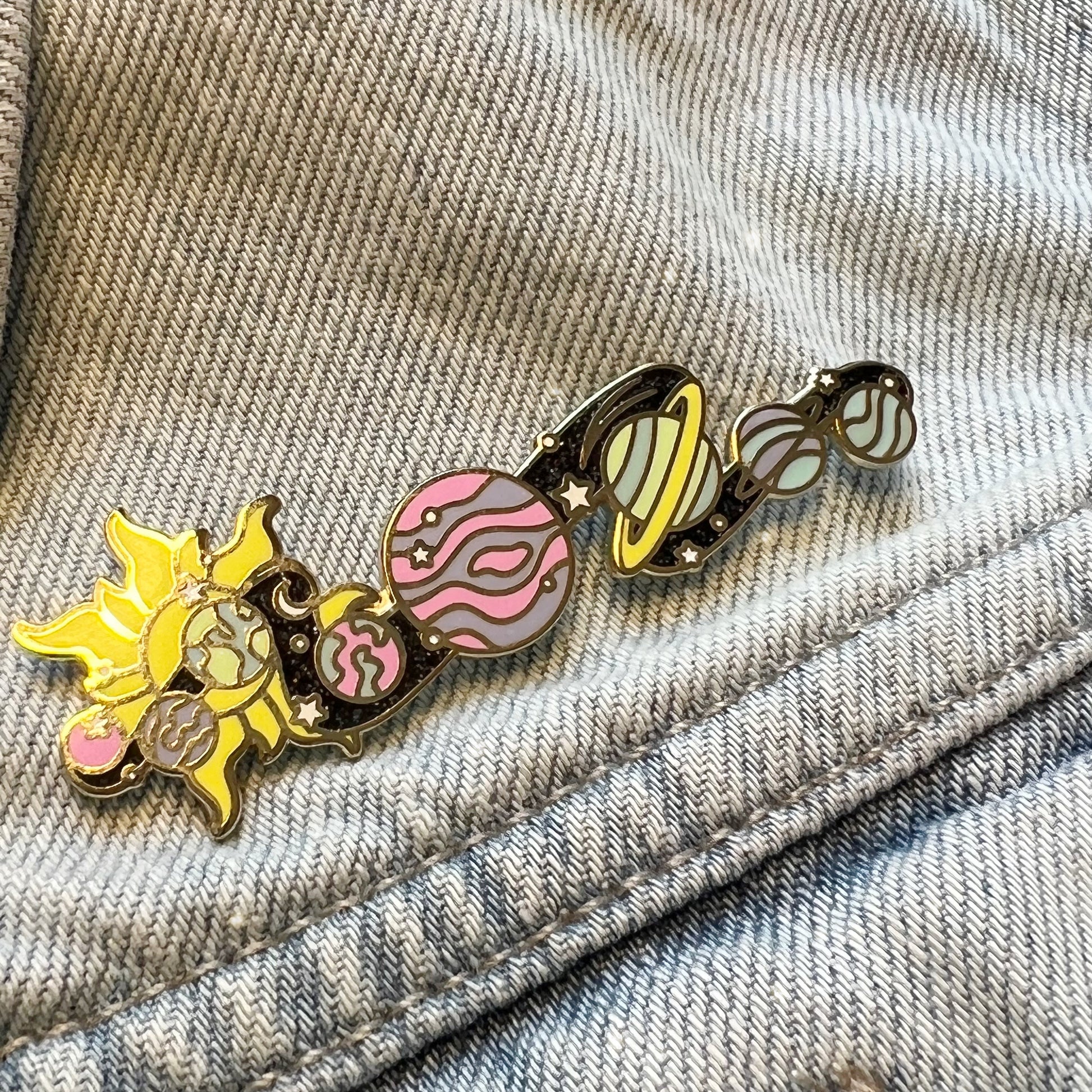 AC00285-MLT-OS - Galaxy Enamel Pin - Space Pins - Planet Cosmic Cosmos Solar System - Wildflower + Co. on jacket closeup