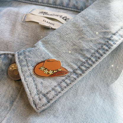 AC00287-BRN-OS - Cowgirl Hat Enamel Pin, Tan  - Wildflower + Co (1) on jacket