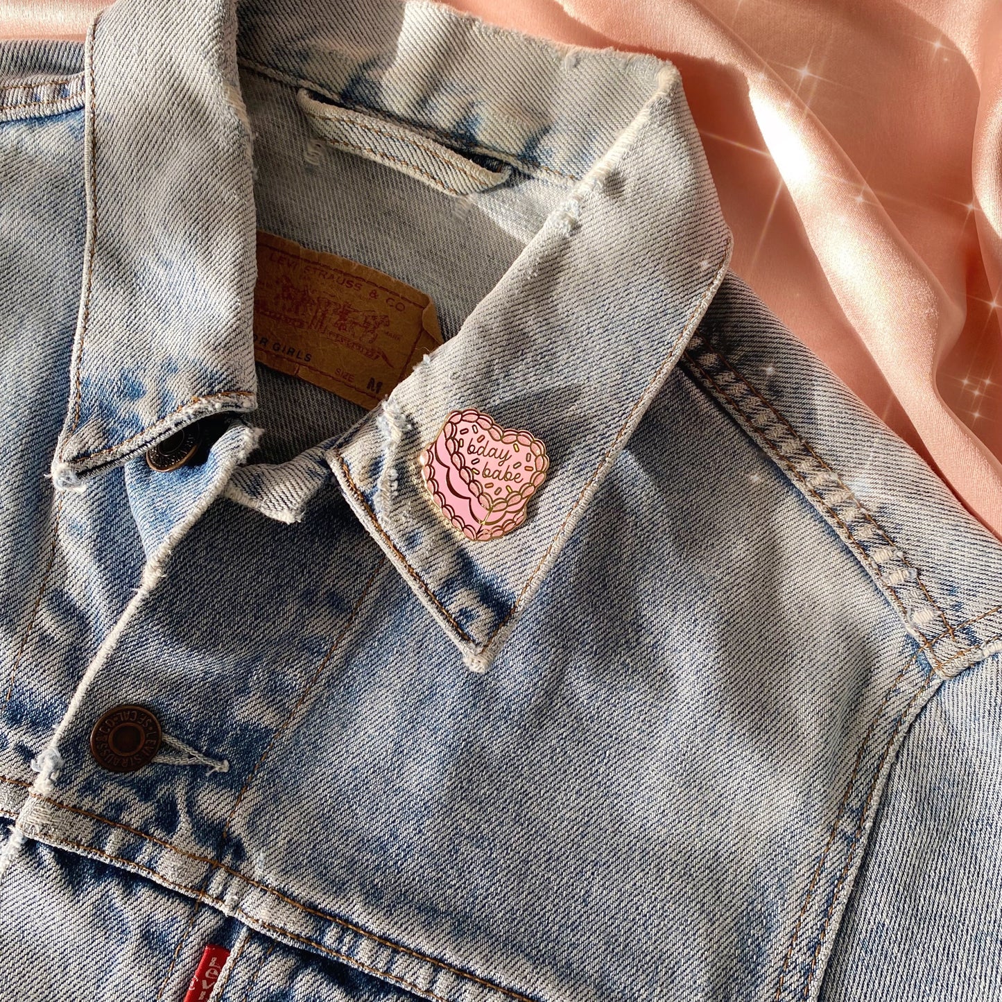 AC00352-PNK-OS - Bday Babe Cake Pin - Wildflower + Co on jacket