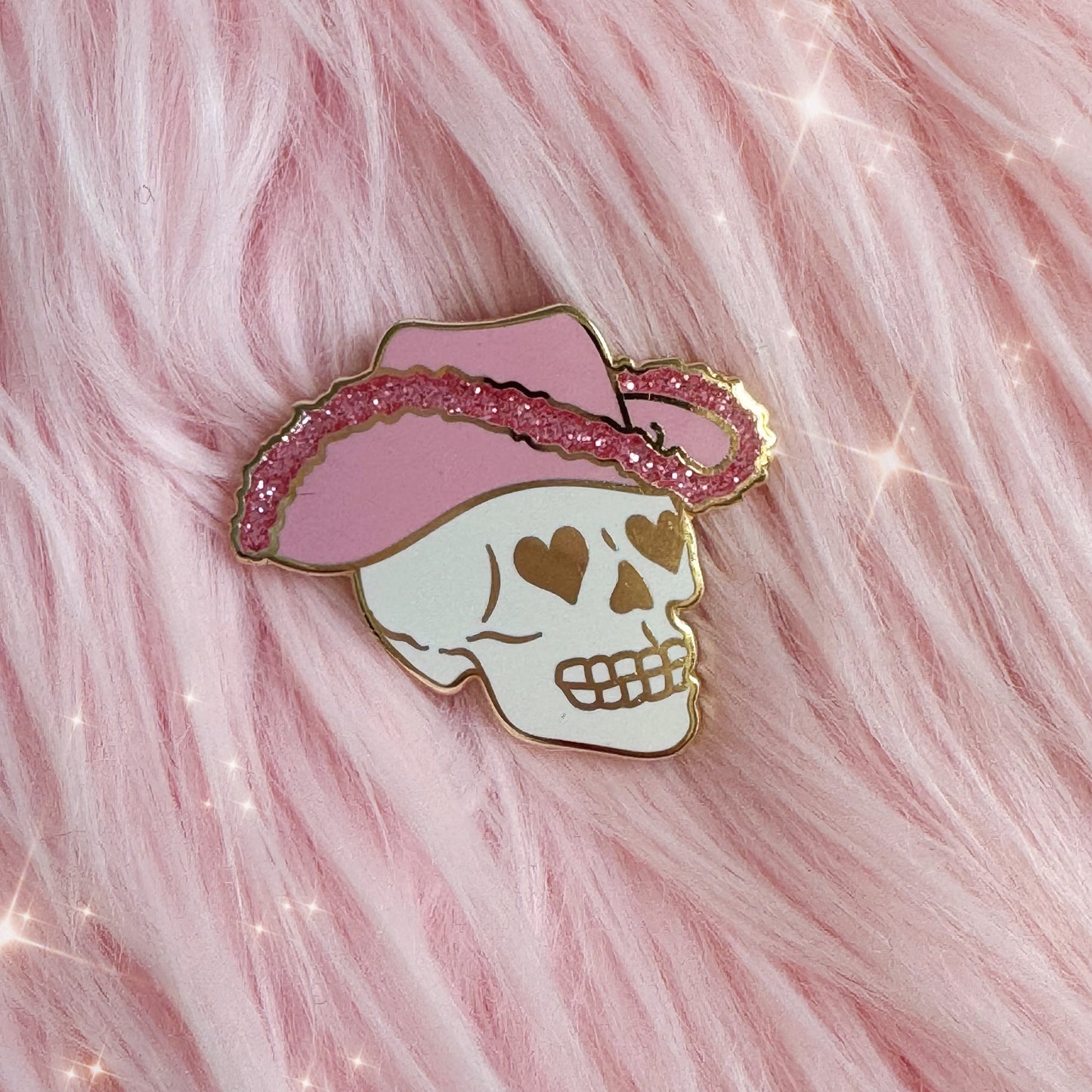 AC00458-MLT-OS - Cowgirl Skull Enamel Pin - Wildflower + Co  on pink faux fur