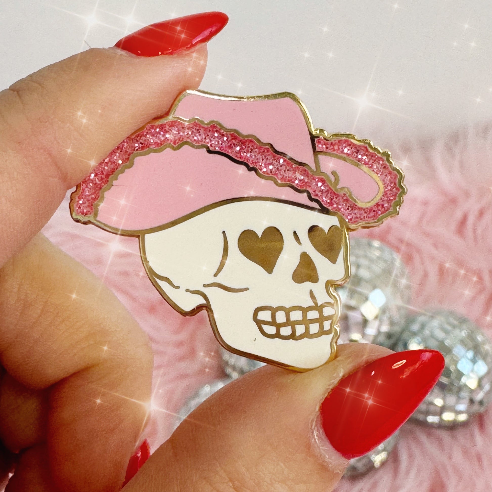 AC00458-MLT-OS - Cowgirl Skull Enamel Pin - Wildflower + Co in hand