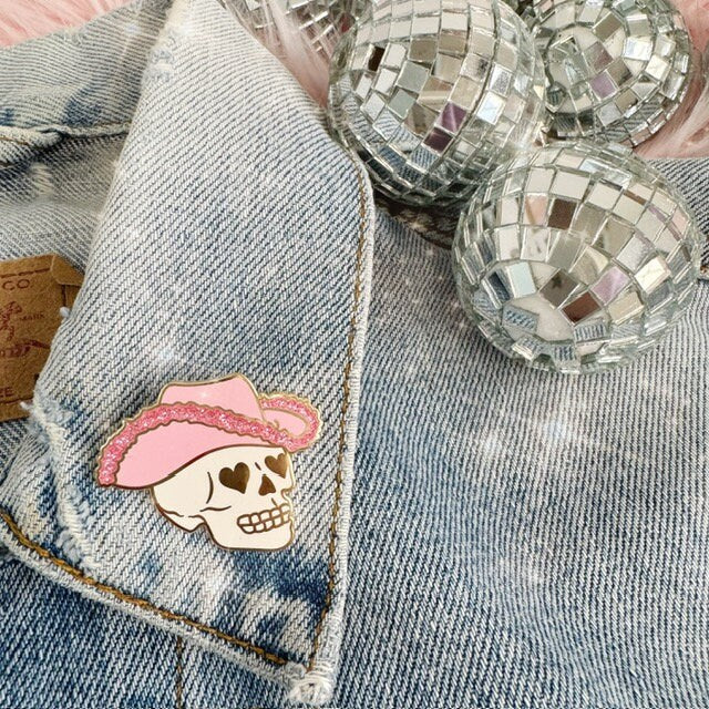 AC00458-MLT-OS - Cowgirl Skull Enamel Pin - Wildflower + Co on jacket closeup