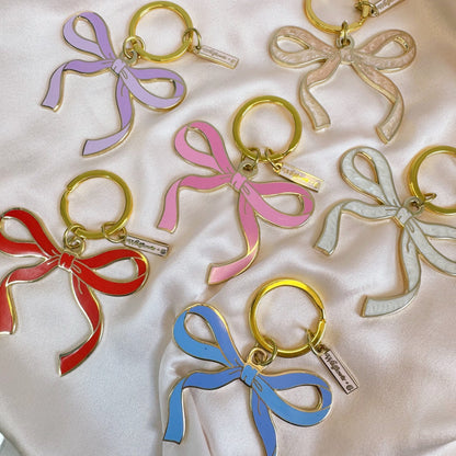 AC00491-all-OS - Bow Enamel Keychain, Pink Red Lilac Blue White  - Cute Coquette Keychains - Ballet Bow Keyring - Royalcore Bag Charm - Balletcore Accessories - Wildflower + Co 