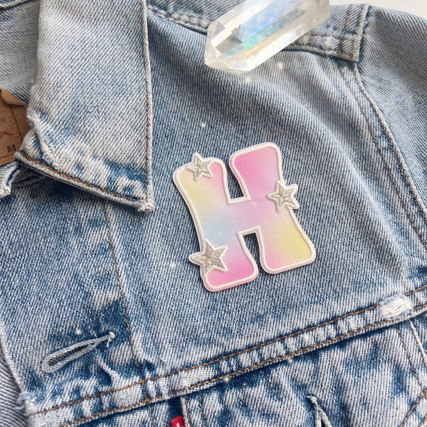 Aura Initial Letter Patch Patches for Jackets - DIY - Embroidered - Wildflower + Co (1) h on jacket scale