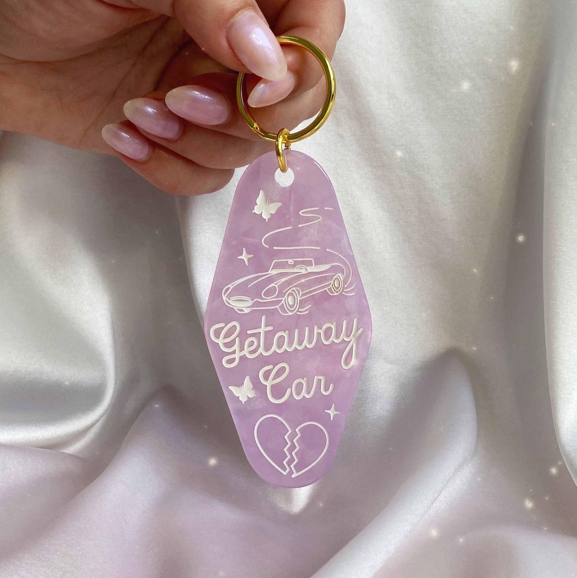 Getaway_Car_Motel_Keychain_-_Lilac_Opalescent_-_Taylor_Swift_Swiftie