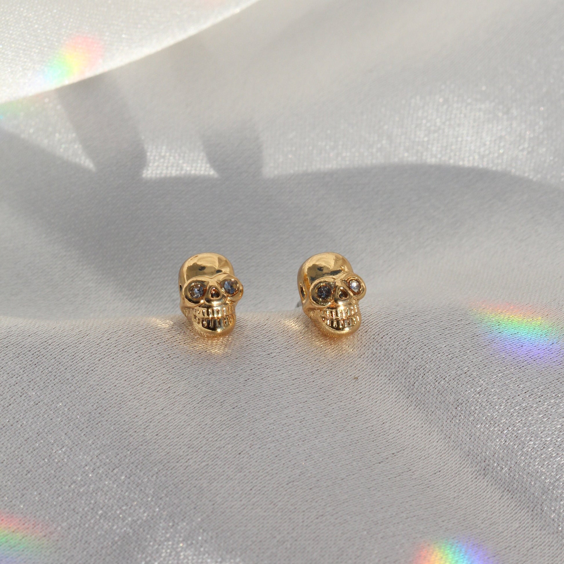 JW00438-GLD-OS-R - Tiny Skull Stud Earrings - Gold - Wildflower + Co. Jewelry Gifting satin
