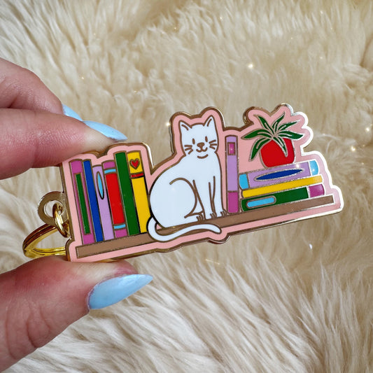Cat Bookshelf Enamel Keychain