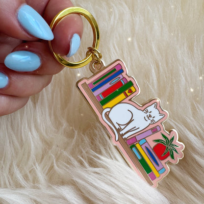 Cat Bookshelf Enamel Keychain
