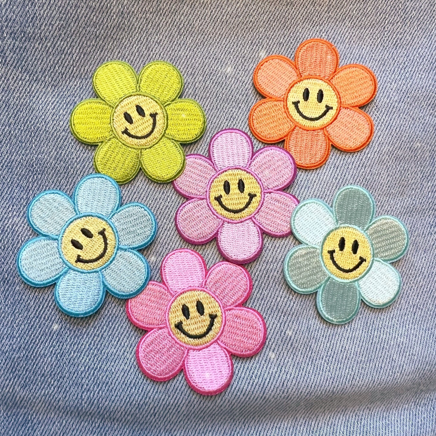 Smiley Face Daisy Patches - Wildflower + Co group pic on denim