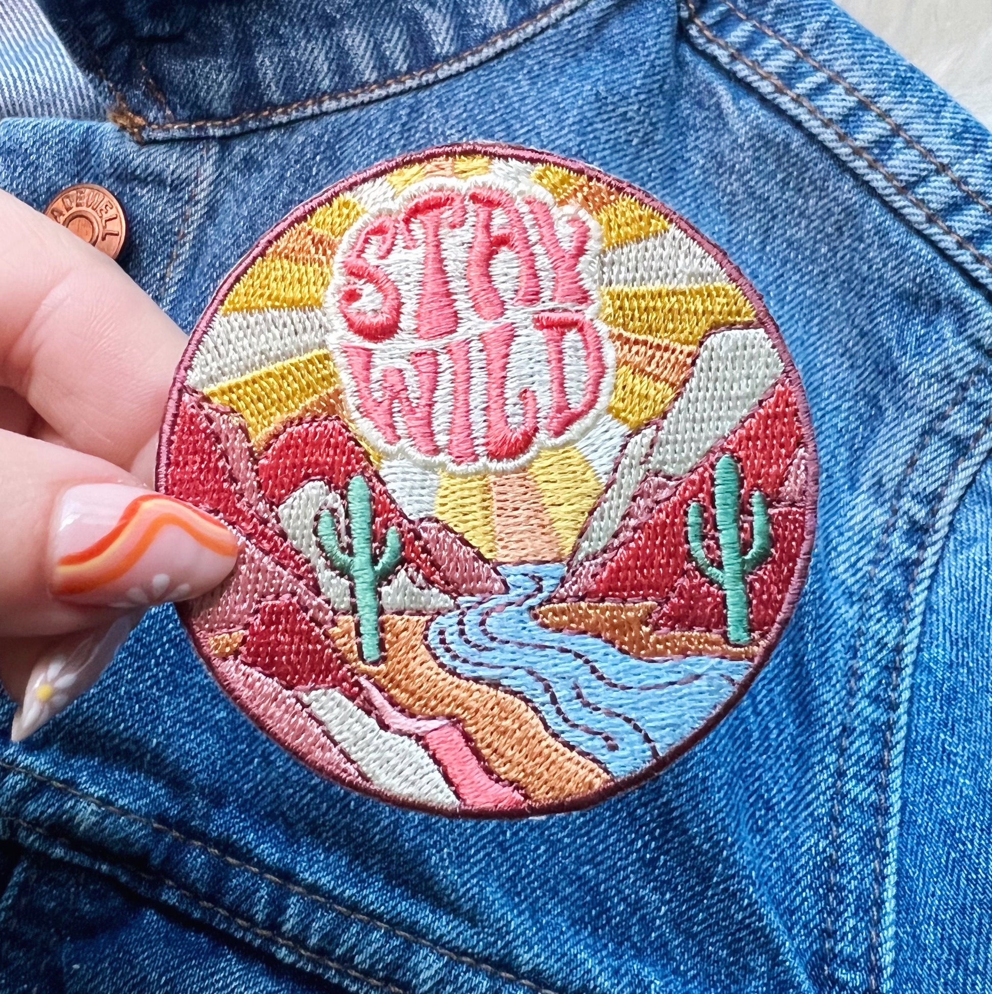 TR00499-MLT-OS Stay Wild Desert Cactus Patch - Embroidered Iron On Patches - Wildflower + Co. DIY (1) hand jacket