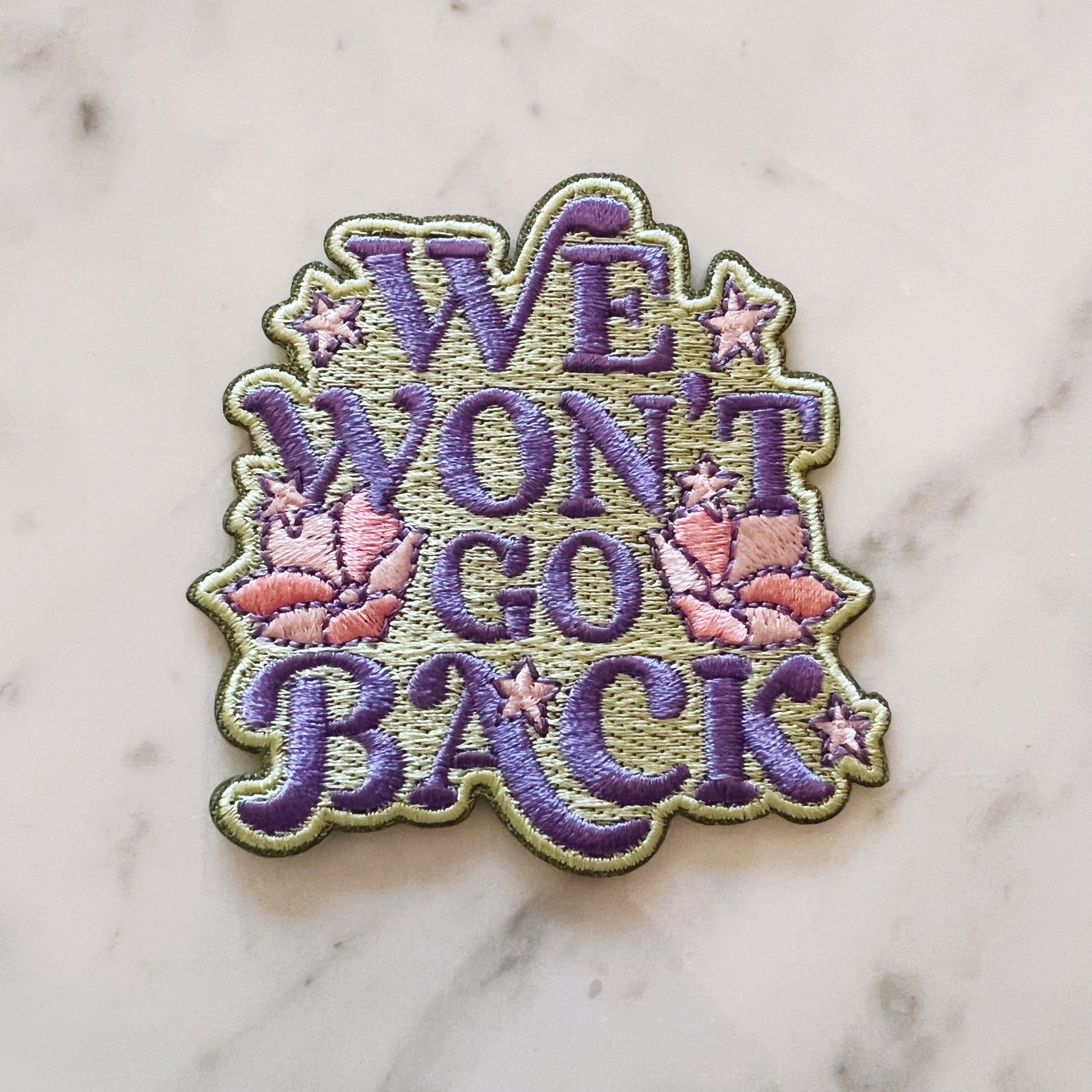 TR00589-MLT-OS_-_We_Won_t_Go_Back_Patch_-_Wildflower_Co