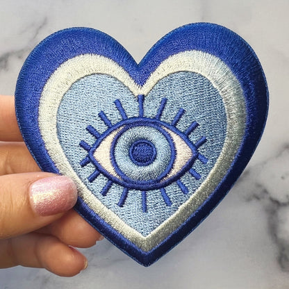 TR00595-BLU-OS - Evil Eye Heart Patch - Wildflower + Co (3) hand