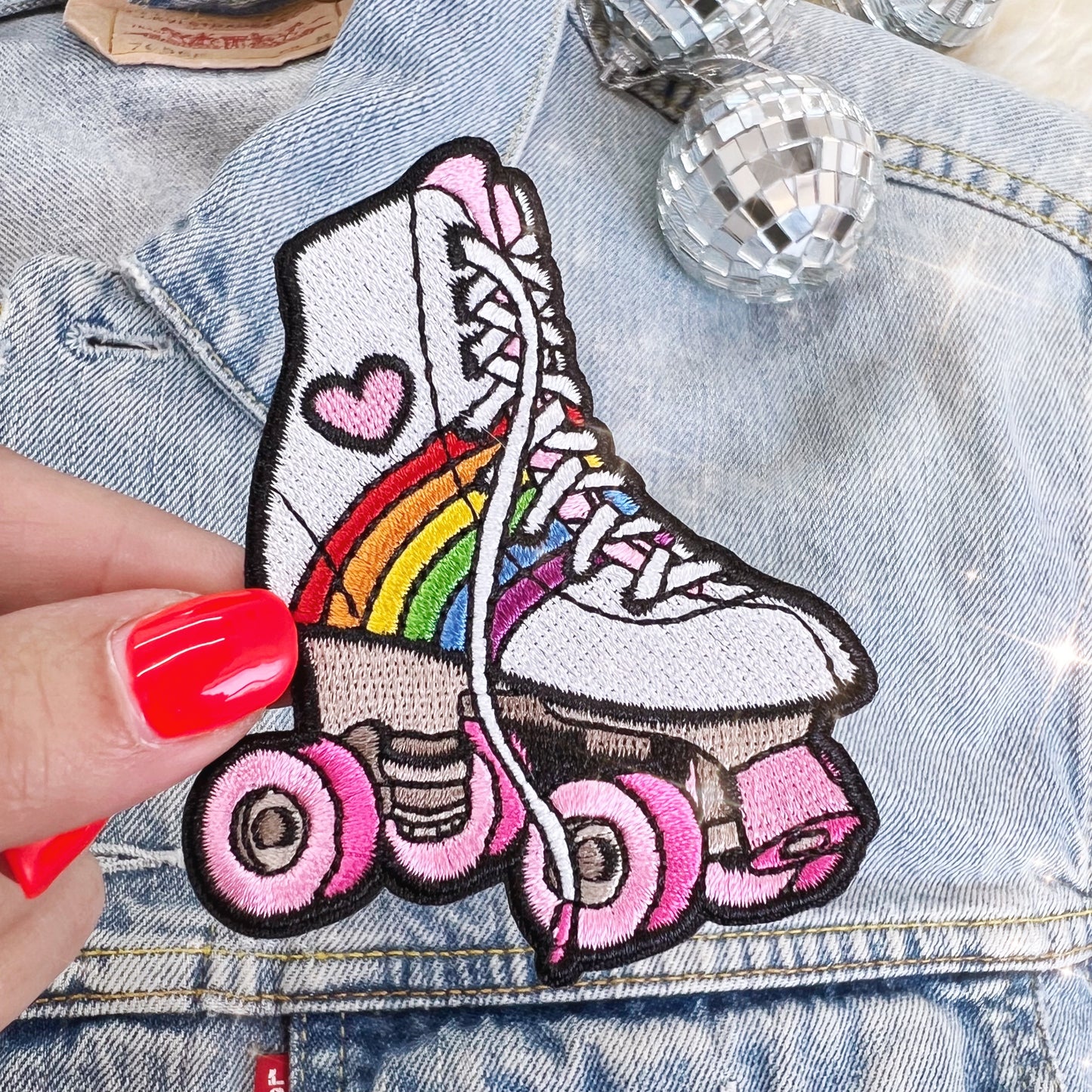TR00622-MLT-OS Rollerskate Patch - Rainbow - Wildflower + Co (1) rainbow in hand