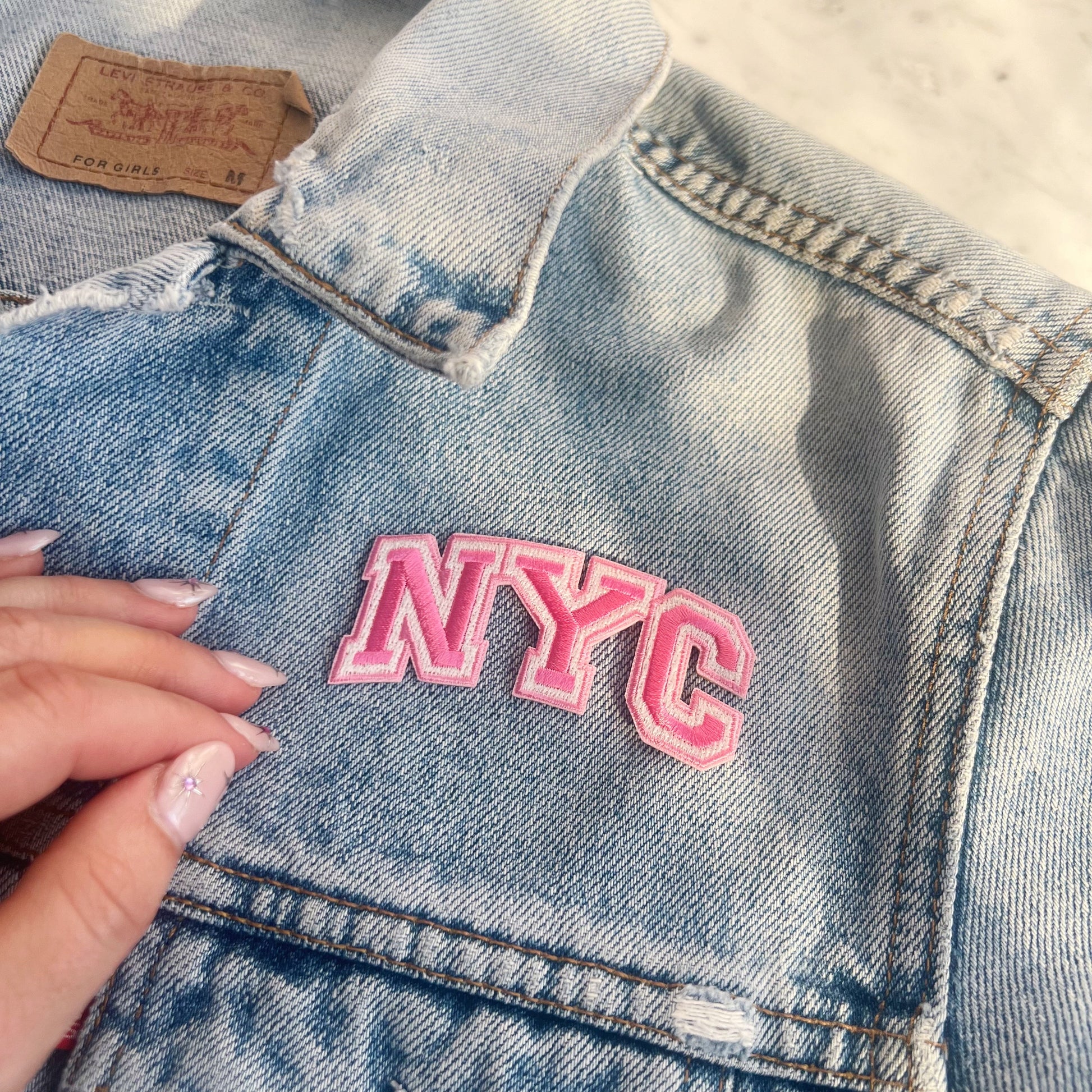 TR00631-PNK-OS - NYC Patch - Pink - Embroidered Iron On Patches for Jackets - New York City Souvenir - Wildflower + Co pink jacket