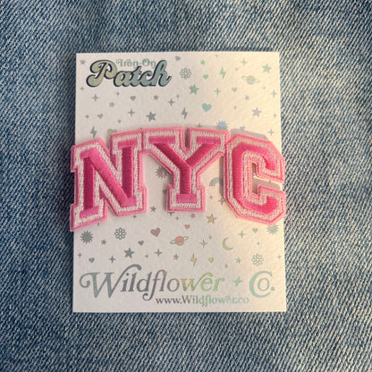 TR00631-PNK-OS - NYC Patch - Pink - Embroidered Iron On Patches for Jackets - New York City Souvenir - Wildflower + Co pink on card