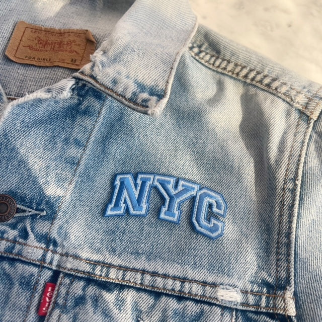 NYC Patch - Embroidered Iron On Patches for Jackets - New York City Souvenir - Wildflower + Co - blue on jacket
