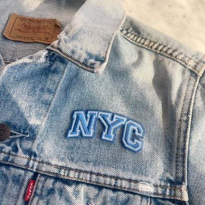 NYC Patch - Embroidered Iron On Patches for Jackets - New York City Souvenir - Wildflower + Co - blue on jacket