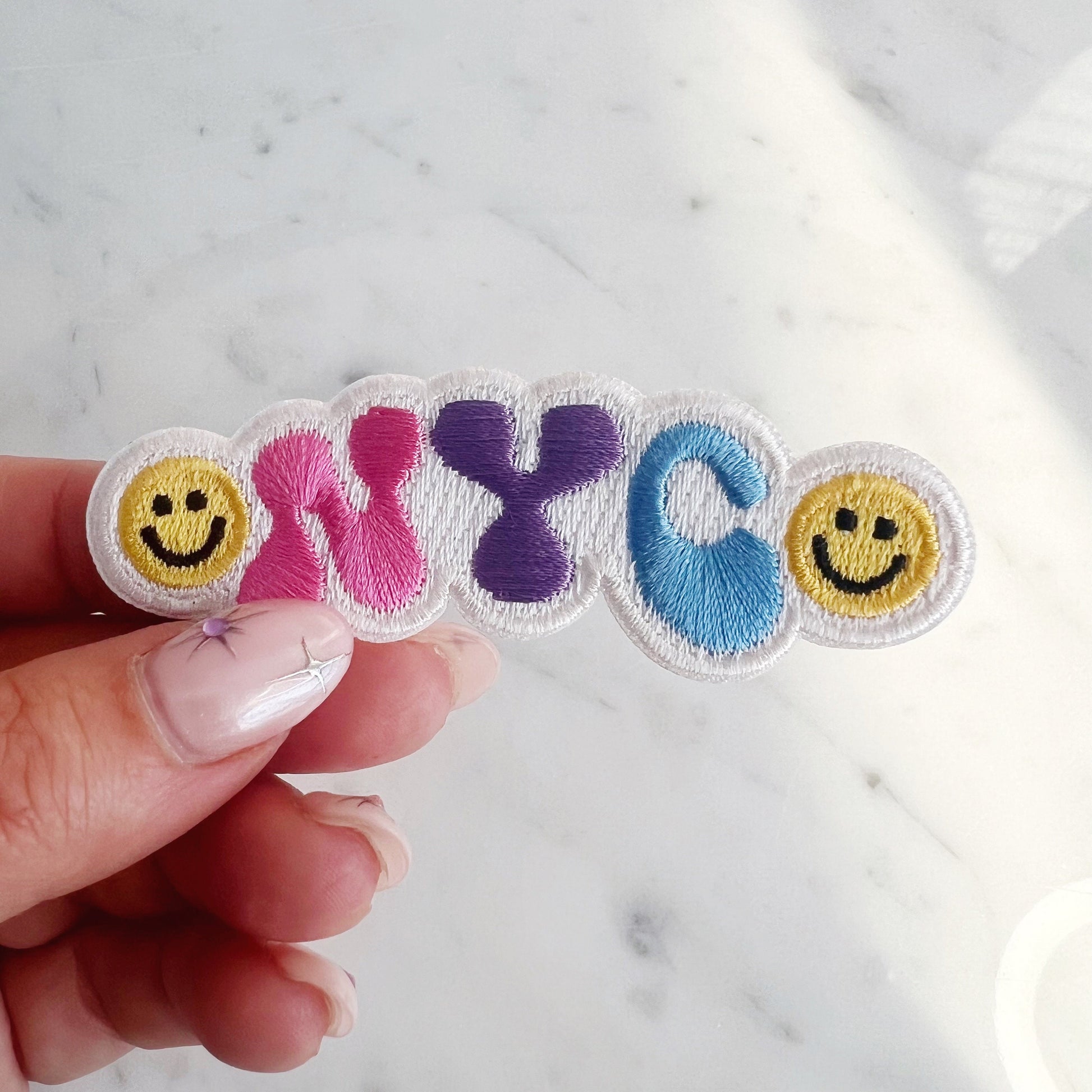 TR00633-MLT-OS - NYC Smiley Patch - Embroidered Iron on Patches for Jackets - Cute New York City Souvenir Gift - Wildflower + Co hand