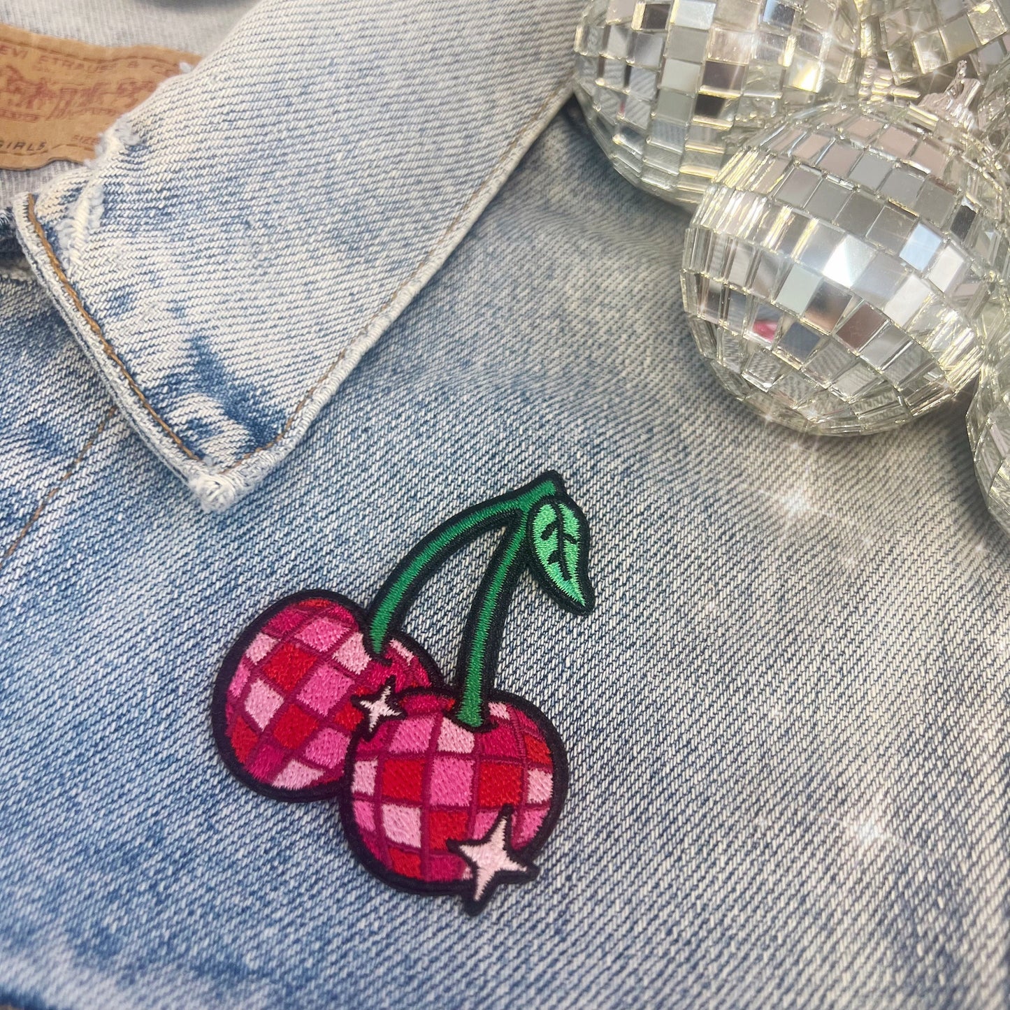 TR00641-MLT-OS - Disco Ball Cherries Cherry Patch - Embroidered Iron on Patches for Jackets - Cute Fruit Gifts - Wildflower + Co - on jacket