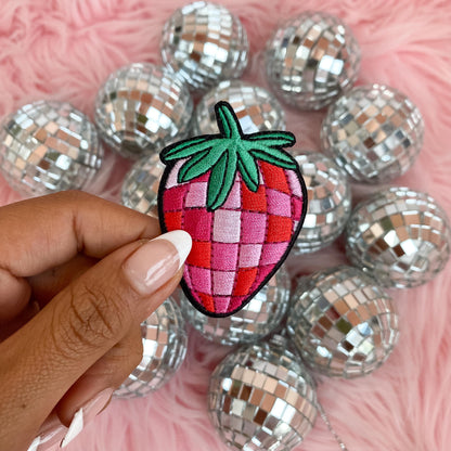 disco strawberry patch - embroidered iron on patch in hand