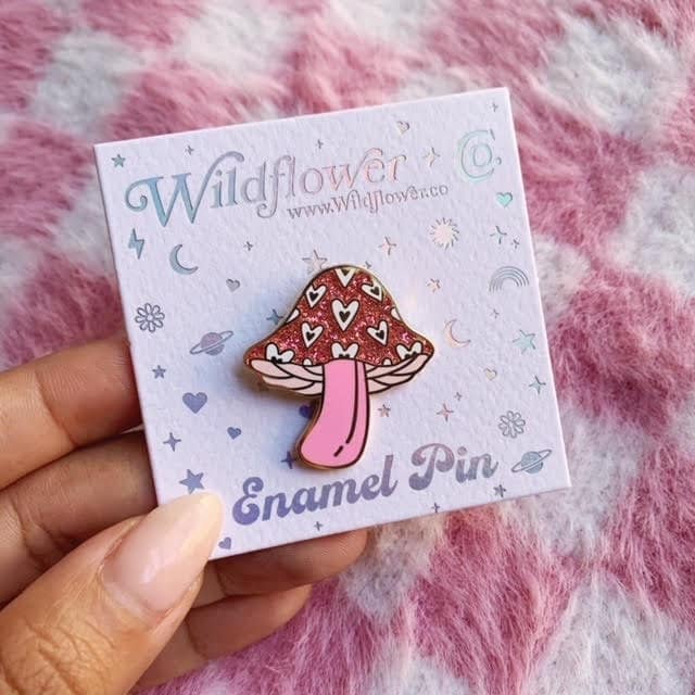 pink glitter mushroom pin with heart detail - on car