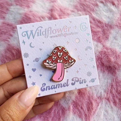 pink glitter mushroom pin with heart detail - on car