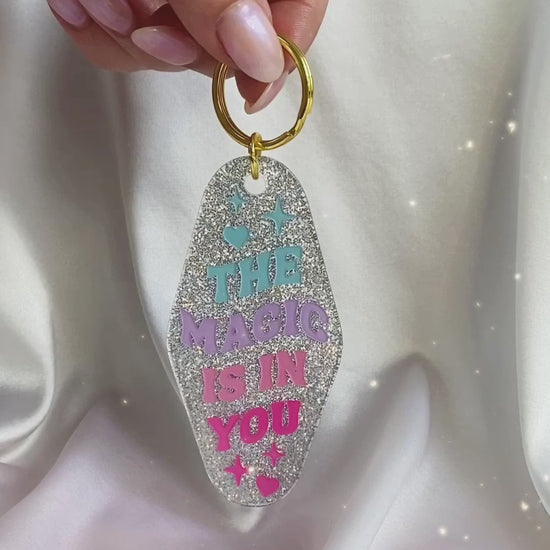 the magic is in you glitter motel keychain video in hand
