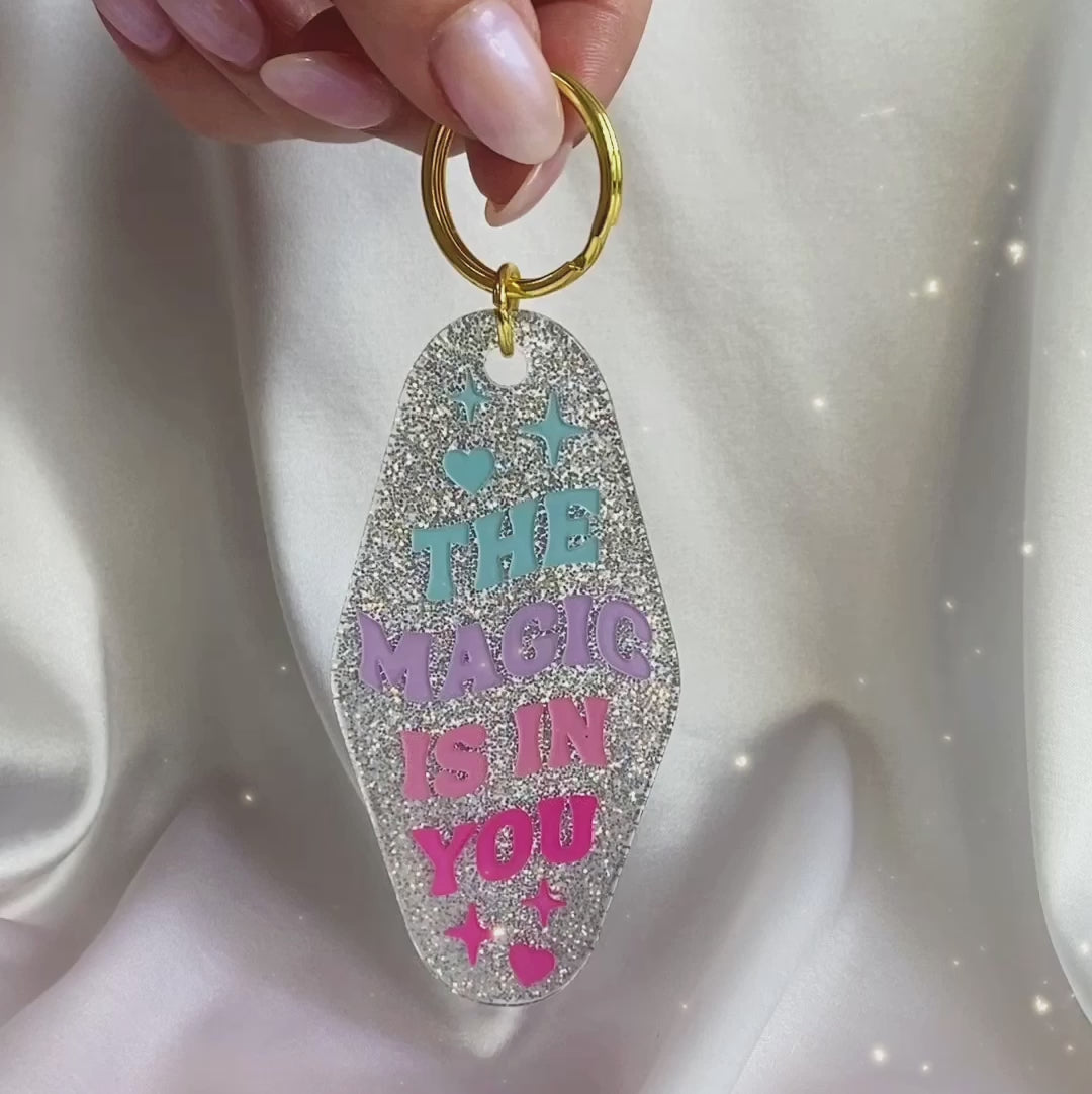 the magic is in you glitter motel keychain video in hand